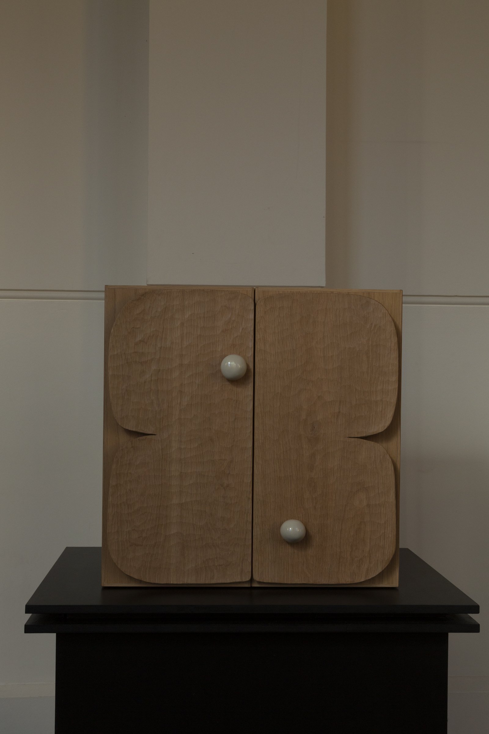 Carve Drinks Cabinet with hand carved doors and ceramic pulls