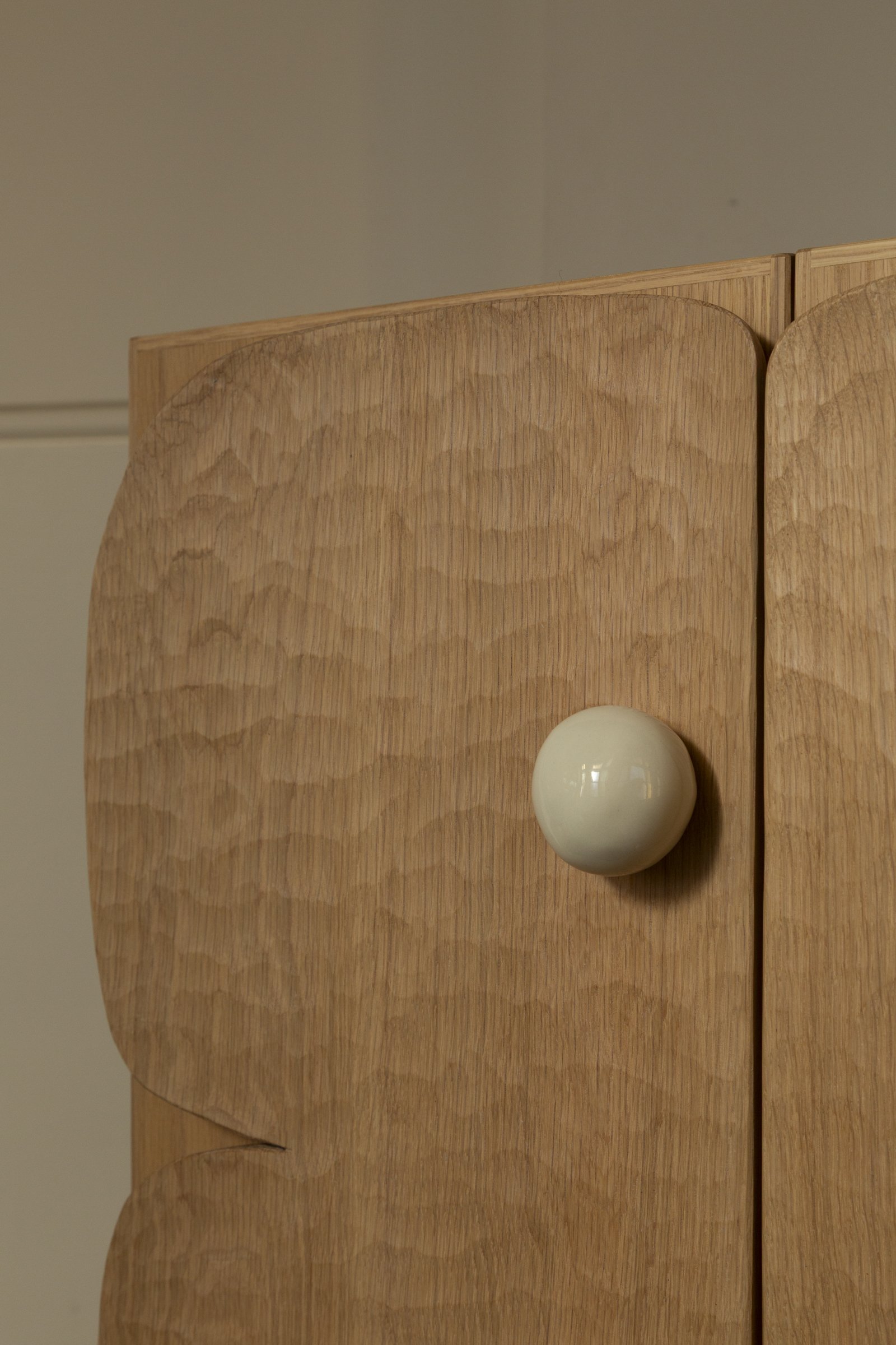 Carve Drinks Cabinet in a gallery setting