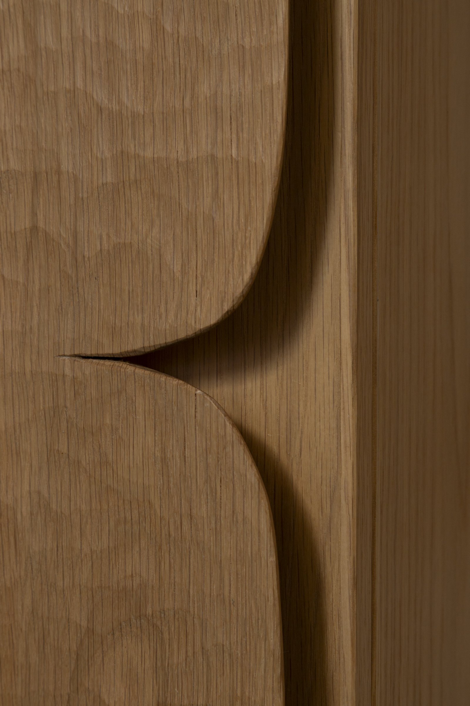 Carve Drinks Cabinet open, showing walnut interior with Tenmoku glazed charms
