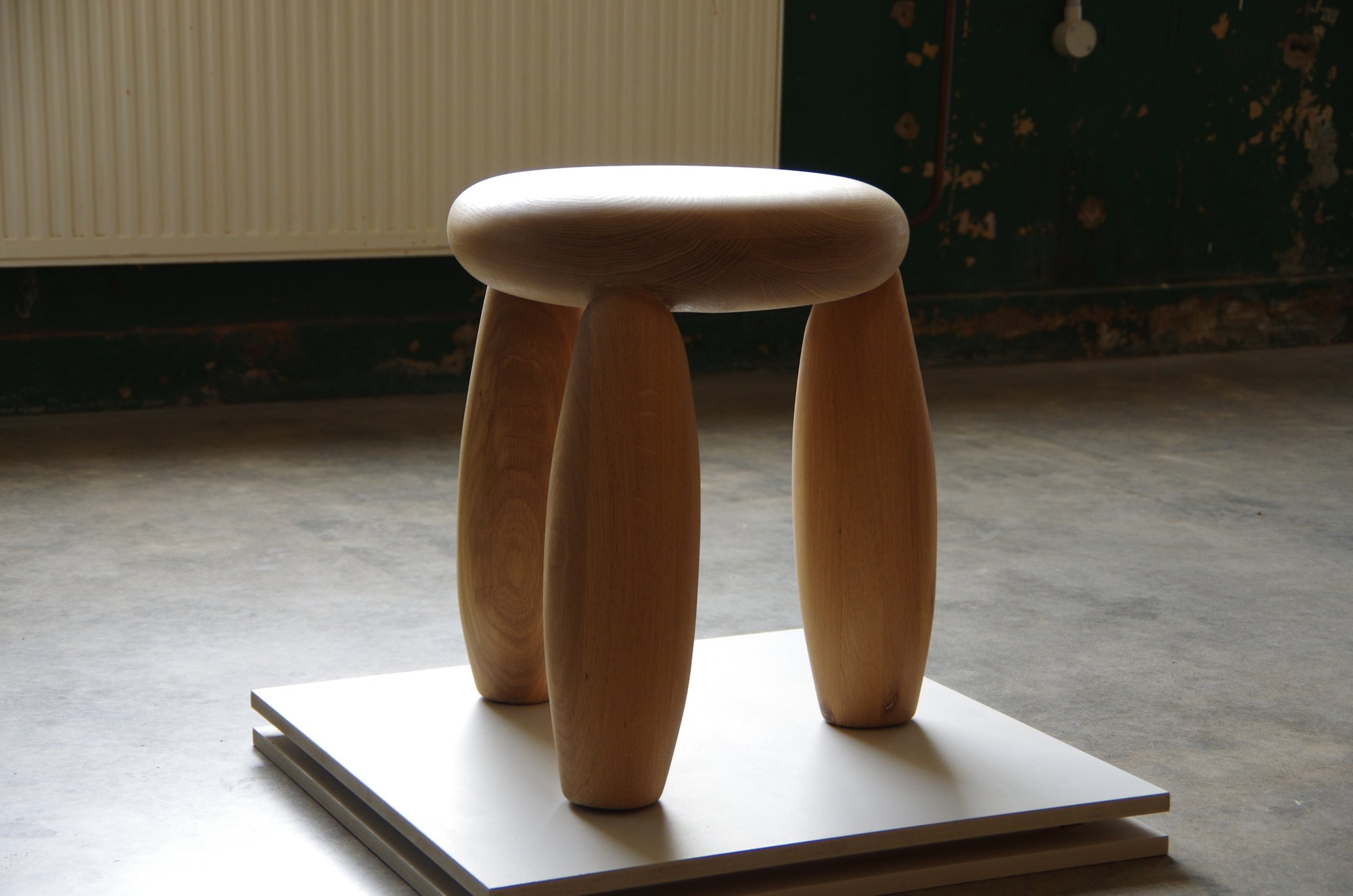 Puff Stool showing sculpted block form