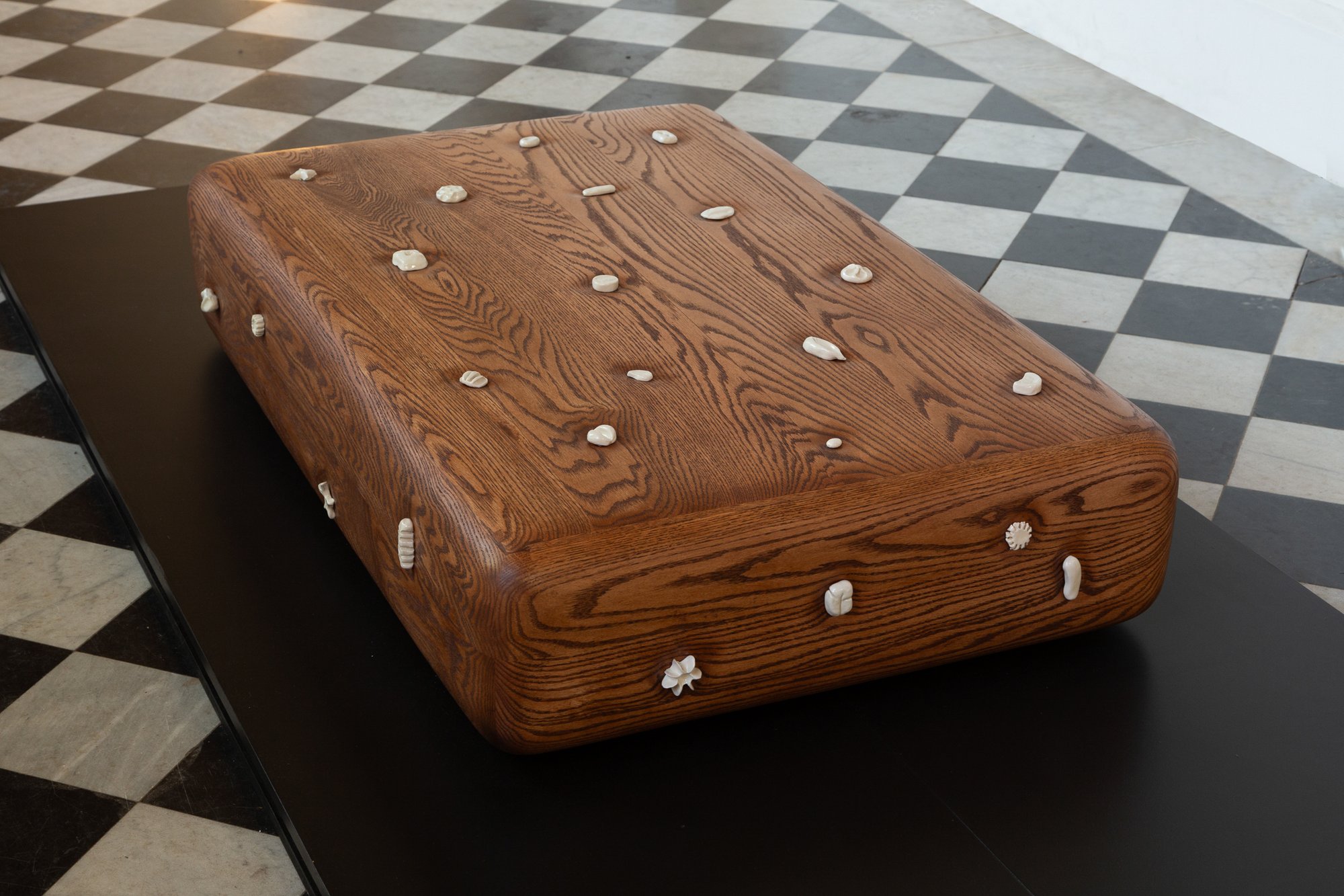 Softly Settled Coffee Table detail of dimpled surface and charms